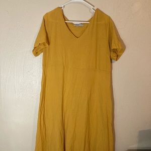 Yellow flowy dress.